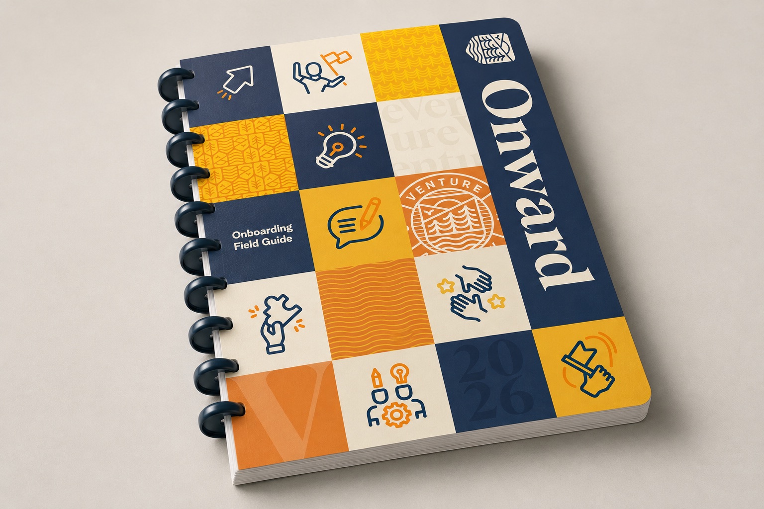 The Venture Onboarding Field Guide, a spiral-bound notebook titled Onward